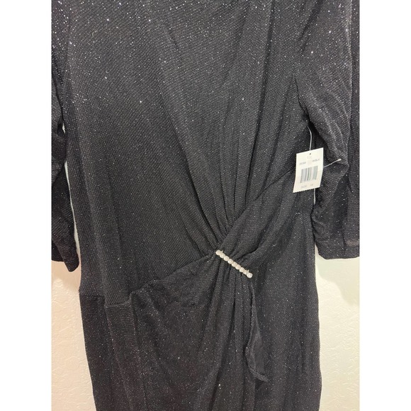 Elegant Black Mini Dress with Subtle Sparkle - Picture 2 of 12